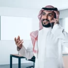 image-69593-saudi-gulf-arab-man-making-phone-call-using-mobile-phone-thumbnail